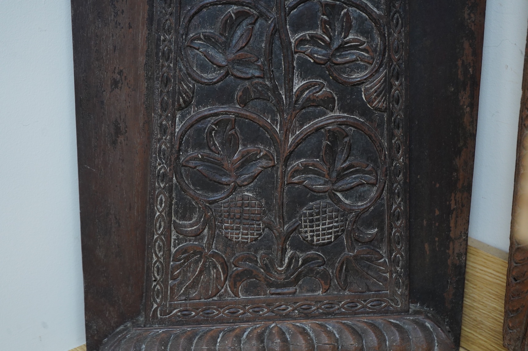 An Anglo-Indian carved wood crest and a similar door portico, latter 127cm in length